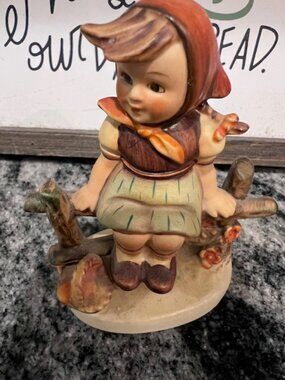 Vintage Hummel figurine girl on fence "Just Resting" highly collectible